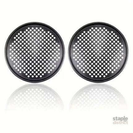 Two pizza baking pans each 30.48 cm in diameter feature ventilation holes for improved cooking efficiency and a