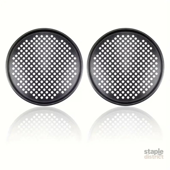 Two pizza baking pans each 30.48 cm in diameter feature ventilation holes for improved cooking efficiency and a